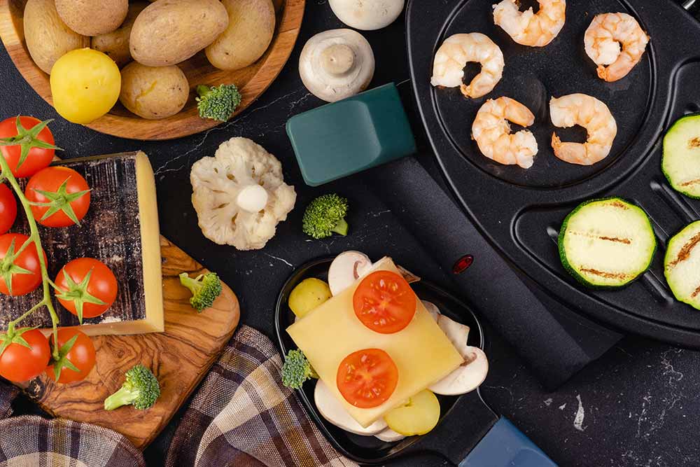 Raclette mit Garnelen und Gemüse